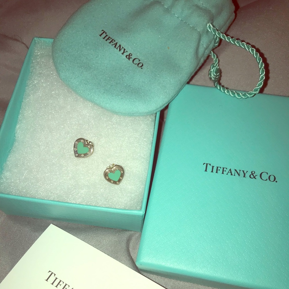 Tiffany & Co sterling silver heart earrings.